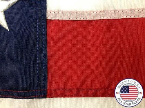 Premium American Flag 3x5' - 100% Made in the USA - Durable, Long Lasting, Bright & Vivid Nylon Material - Densely Embroidered Stars, Sewn Stripes with Lock Stitching, Four Rows of Lock Stitching on the Fly End, Tough Enough for Both Commercial and Reside